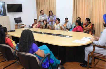Self-help group women share their experiences and presentation with Governor at LBSNAA.