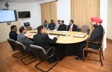 Chief Information Commissioner Mr. Anil Chandra Punetha and other officers giving presentation of the activities and activities of the Commission to the Governor.