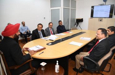 Chief Information Commissioner Mr. Anil Chandra Punetha and other officers giving presentation of the activities and activities of the Commission to the Governor.