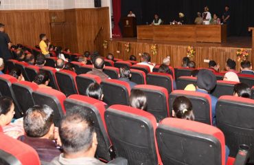 Governor listening to the problems of Raj Bhawan personnel and their families in the Parivar Milan program organized at Raj Bhawan Auditorium.