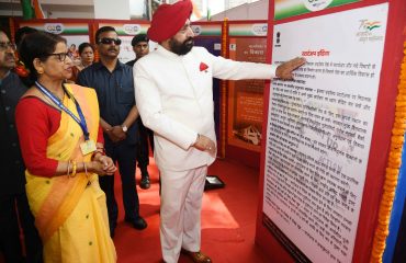 Governor Lt. Gen. Gurmit Singh (Retd) observing the exhibition at the program.