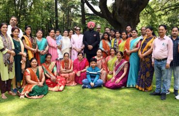 Governor Lt. Gen. Gurmit Singh (Retd) interacts with women from self-help groups, along with First Lady Smt. Gurmeet Kaur.