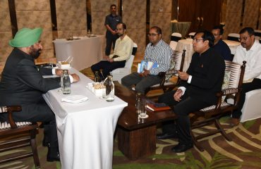 Governor meeting the SDM, Tehsildar and Revenue Sub-Inspector during his visit to Ramnagar.