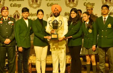 Governor Lt Gen Gurmeet Singh (Retd) felicitating the students of Sherwood College, Nainital.
