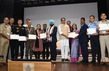 Governor felicitating the best trained participants in the program organized at LBSNAA, Mussoorie.