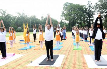 Governor Lt. Gen. Gurmit Singh (Retd) performs yoga on the occasion of International Yoga Day.