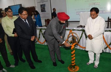Governor Lt. Gen. Gurmit Singh (Retd) inaugurates the state level workshop organized at Government Doon Medical College, by lighting the lamp.