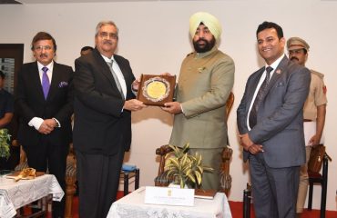 Governor Lt Gen Gurmit Singh (Retd) felicitating CA Ashok Kashyap and CA Rakesh Nangia on the occasion of Platinum Jubilee celebrations.