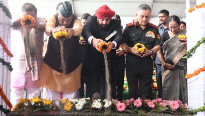 Governor Lt. Gen. Gurmit Singh (retd) places the holy soil brought from the martyrs' courtyard at SainyaDham, Guniyal village, Dehradun.