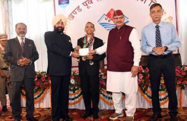 Governor Lt. Gen. Gurmit Singh (Retd) honours the students who excelled in the 19th Foundation Day program of UPNL.