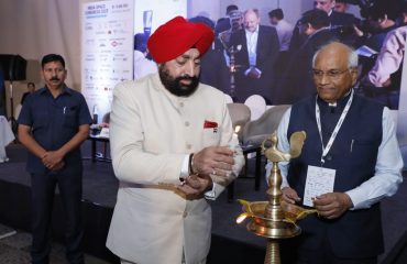 Governor Lt Gen Gurmeet Singh (R) lighting the lamp to inaugurate the Indian Space Congress program in New Delhi.