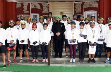 Governor Lt Gen Gurmit Singh (Retd) interacts with the participants of the cycling event at Raj Bhawan.