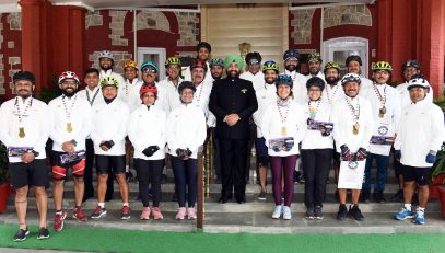 Governor Lt Gen Gurmit Singh (Retd) interacts with the participants of the cycling event at Raj Bhawan.