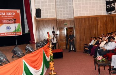 Governor Lt. Gen. Gurmit Singh (Retd) listens to the patriotic song presented by ITBP jawan Arjun Khedial in the program.