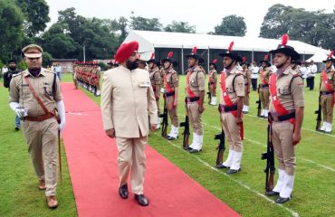 Governor Lt Gen Gurmit Singh (Retd) takes the salute of the march past of PAC jawans at Raj Bhawan.