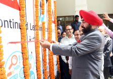 Governor Lt Gen Gurmit Singh (Retd) inaugurates the mobile e-learning vehicle by cutting the ribbon.;?>