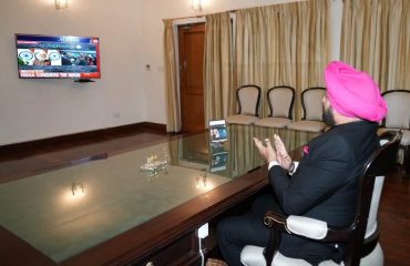 Governor Lt Gen Gurmit Singh (Retd) watching the live telecast of the successful landing of Chandrayaan-3.