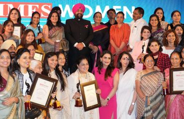 Governor Lt Gen Gurmit Singh (Retd) with the achievers at the 'Times Women Achievers Award'.