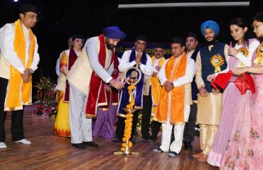 Governor Lt. Gen. Gurmit Singh (retd) lights the lamp to inaugurate the sixth convocation ceremony of Hemwati Nandan Bahuguna Medical Education University.