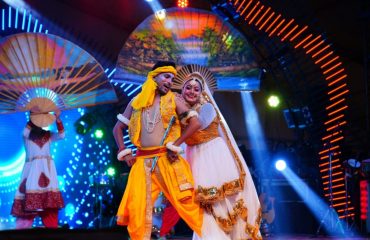 Artists present dance based on Shri Krishna and Radha.