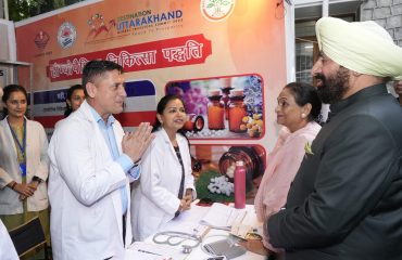 03Governor Lt Gen Gurmit Singh (Retd) inspects the stalls set up during the programme.