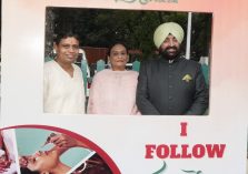 Governor Lt Gen Gurmit Singh (Retd), First Lady Mrs. Gurmeet Kaur and Patanjali CEO Acharya Balkrishna take a selfie at the selfie point installed in the program.;?>
