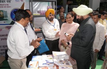 Governor Lt Gen Gurmit Singh (Retd) inspects the stalls set up during the programme.