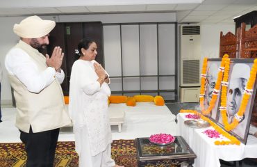 Governor Lt Gen Gurmit Singh (Retd) pays tribute by offering flowers on the portraits of Father of the Nation Mahatma Gandhi and former Prime Minister Shri Lal Bahadur Shastri.