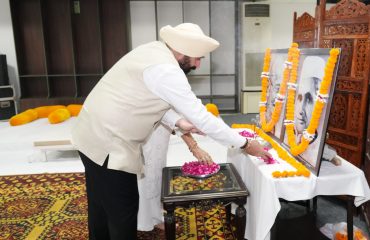 Governor Lt Gen Gurmit Singh (Retd) pays tribute by offering flowers on the portraits of Father of the Nation Mahatma Gandhi and former Prime Minister Shri Lal Bahadur Shastri.