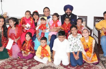 Governor Lt Gen Gurmit Singh (Retd) and First Lady Smt. Gurmeet Kaur performing Kanya Puja.