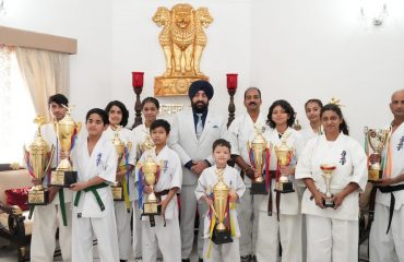 Founder Chairman, International Karate Organization Shri Dev Nath and championship winning children pay courtesy call on Governor Lt Gen Gurmit Singh (Retd).
