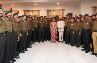 Governor Lt Gen Gurmit Singh (Retd) with army personnel deployed in Dehradun.