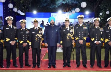 Governor interacts with officers on the occasion of Navy Day.