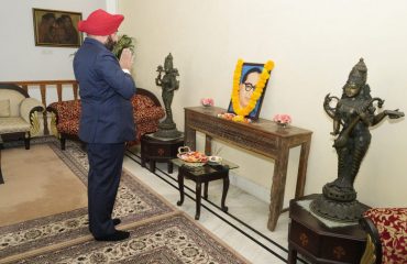 Governor Lt Gen Gurmit Singh (Retd) offering flowers on the portrait of Bharat Ratna Baba Saheb Dr. Bhimrao Ambedkar on his Mahaparinirvan Day.