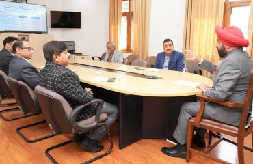 Planning Secretary, Industries Secretary and Director General Industries giving information to the Governor about the preparations and progress of the Global Investors Summit to be organized in Uttarakhand.