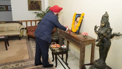 Governor Lt Gen Gurmit Singh (Retd) offering flowers on the portrait of Bharat Ratna Baba Saheb Dr. Bhimrao Ambedkar on his Mahaparinirvan Day.