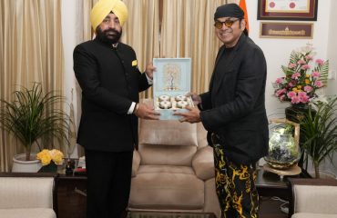 Director Anupam Sharma and executive producer Bobby Cash of the film 'One in a Billion' pay courtesy call on Governor Lt Gen Gurmit Singh (Retd).