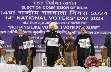 Governor releasing the coffee table book on the occasion of 'National Voters' Day'.