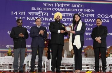 Governor being felicitated on the occasion of 'National Voter's Day'.