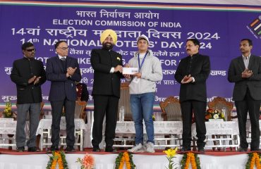 Governor being felicitated on the occasion of 'National Voter's Day'.