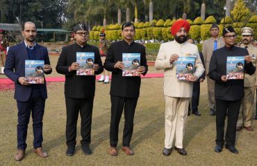 Governor releasing the magazine Devbhoomi Samvad of Uttarakhand at Raj Bhawan.