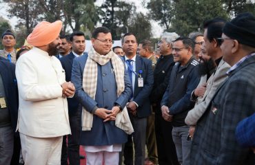 Governor meeting dignitaries including Chief Minister Pushkar Singh Dhami in the High Tea program organized at Raj Bhawan.