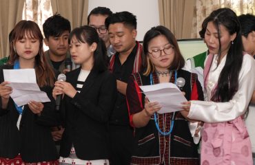 Students presenting songs in the program.