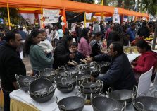 People making purchases after getting information about the products displayed in the stalls.;?>