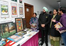 Governor inspecting the art gallery and photo exhibition at Raj Bhawan.;?>