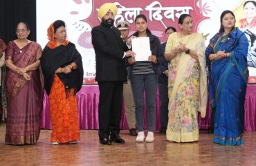 Governor rewarding the girls who secured the best position in the Uttarakhand Board 2023 examinations.