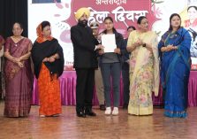 Governor rewarding the girls who secured the best position in the Uttarakhand Board 2023 examinations.;?>
