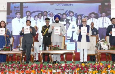 Governor releasing the book on the occasion of a program organized at Devbhoomi Uttarakhand University.