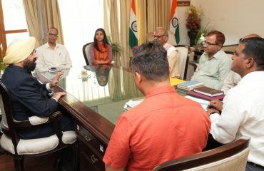 The Hon'ble Governor getting information about the activities of the university with Sanskrit Education Secretary Chandresh Kumar Yadav and V C of Uttarakhand Sanskrit University, Prof. Dinesh Chandra Shastri.
