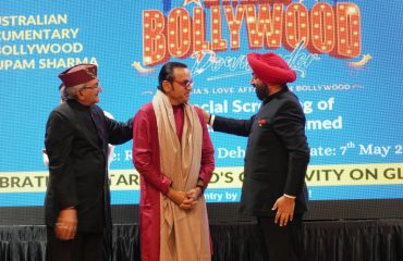 ⁠The Hon'ble Governor honouring film director Anupam Sharma by presenting him a shawl as a token of appreciation at Raj Bhawan.